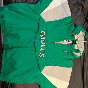 Kelly green eagles starter jacket has one stain